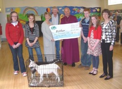 Representatives of St John's Malone present a cheque to Bishop Edward Darling of the charity Bothar.